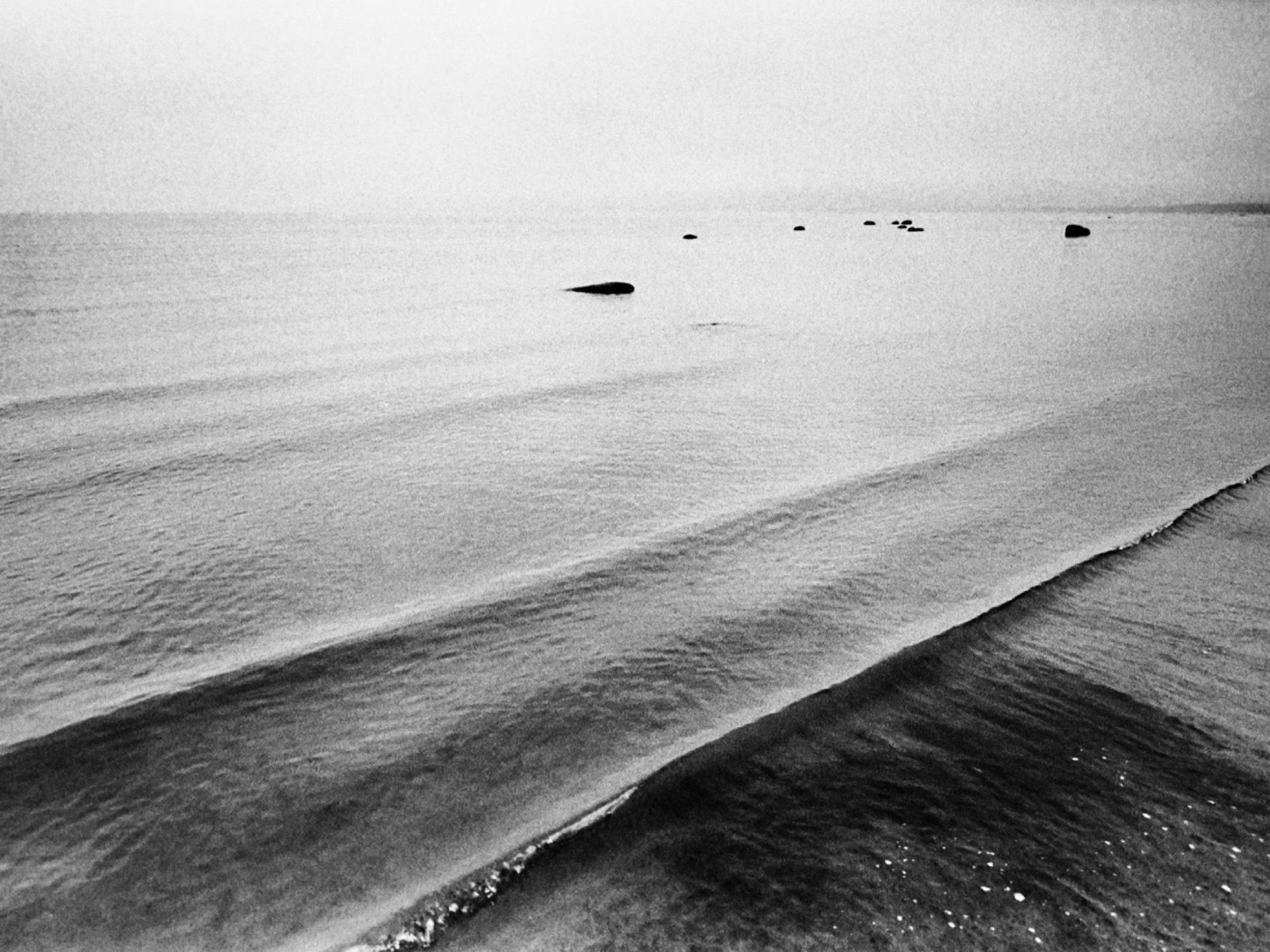 Minimalistiskt hav med sandbank